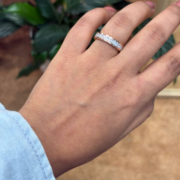 Rose Gold Finish Ring With Line Of Princess Cut CZ