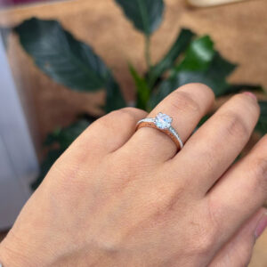 Shiny Round Solitaire Ring With Side Sparkle